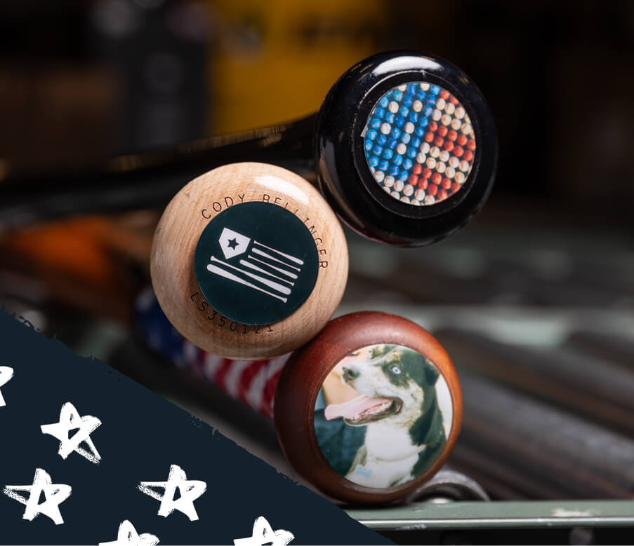 Several bats that have been personalized with custom end caps