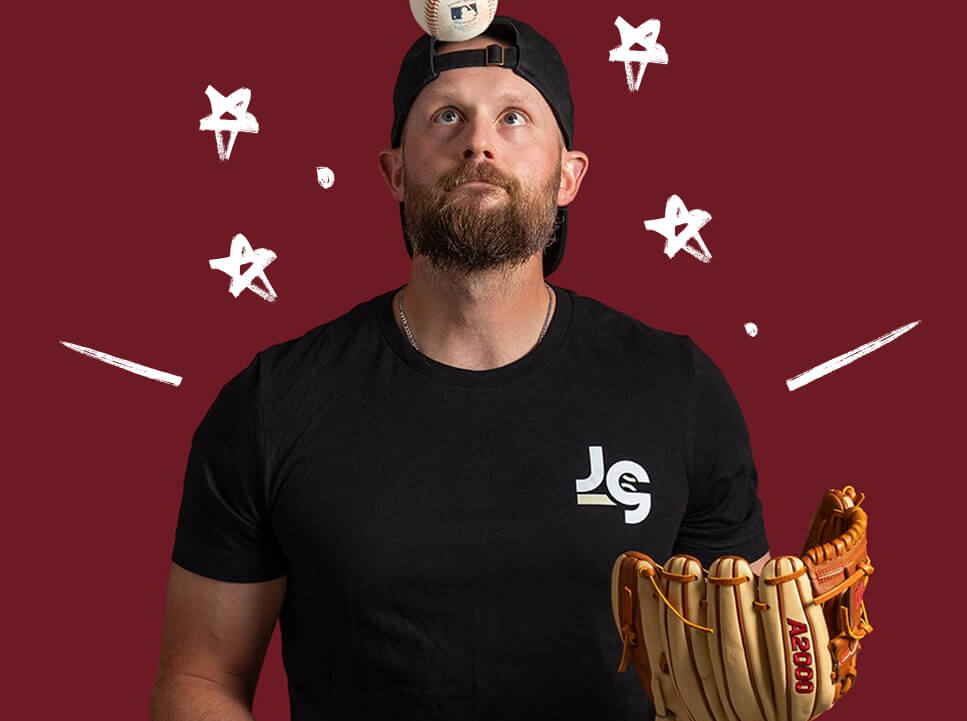 Our Glove Expert, Ben, is wearing a glove and looks up, ready to catch a falling ball