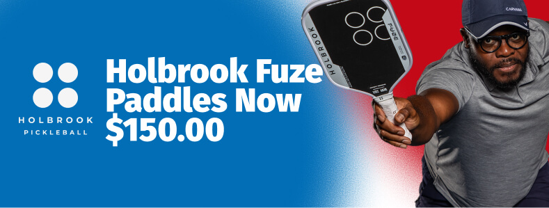 Holbrook Fuze Paddles Now $150.00. A man holds a Holbrook pickleball paddle.