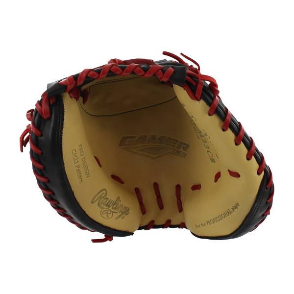 Inside view of a black and tan Rawlings Gamer XLE catchers mitt with red lacing and visible branding.