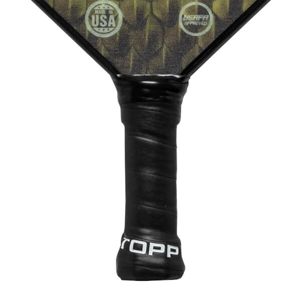 Close-up of a black pickleball paddle grip with white TOPP branding and USAPA Approved and Made in USA logos on the head.