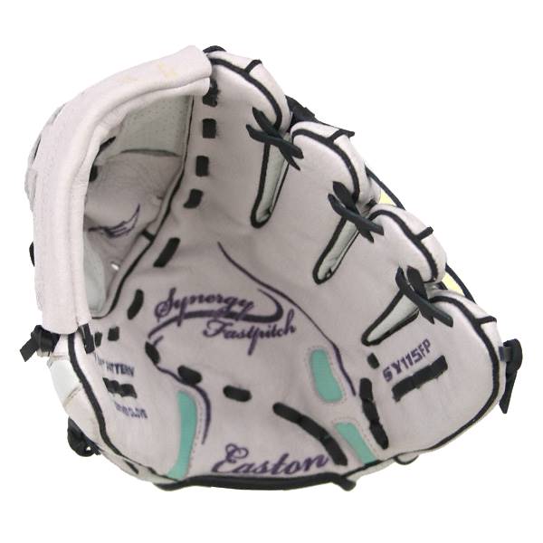 Top-down view of a white Easton Synergy Fastpitch youth glove with black lacing and teal accents.