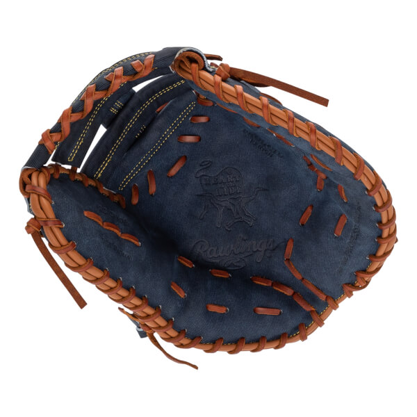 Top-down view of a blue baseball glove with brown lacing and Rawlings branding.
