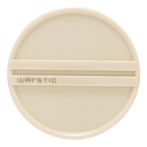 Top-down view of a cream circular bat end cap with two horizontal raised lines and embossed WARSTIC text.