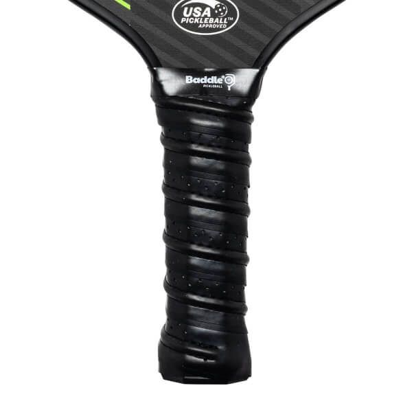 Close-up of a black pickleball paddle grip with Baddle branding and USA Pickleball Approved logo.