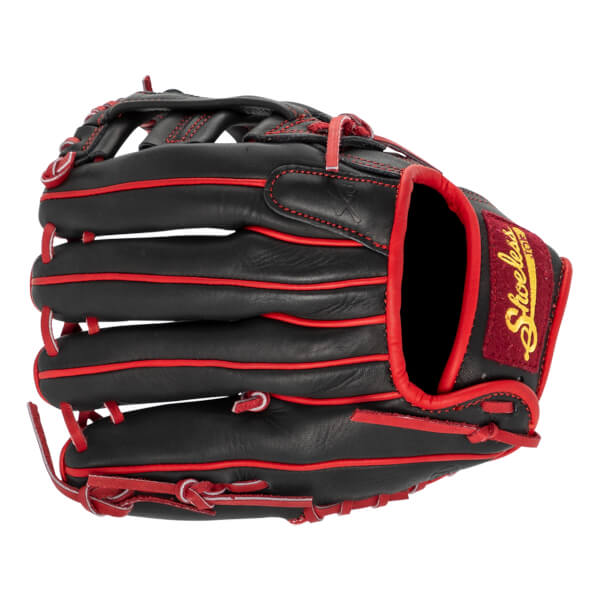Side view of a black baseball glove with red lacing, trim, and a Shoeless Joe logo on the wrist.