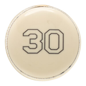 Top-down view of a cream baseball bat end cap with a black outlined 30 and a defined edge.