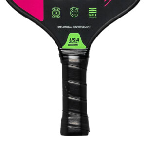 Close-up of a black pickleball paddle grip with USA Pickleball Approved logo and STRUCTURAL REINFORCEMENT text.