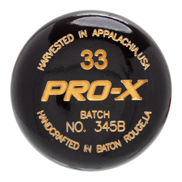 End view of a black baseball bat with gold text PRO-X, 33, BATCH NO. 345B, HARVESTED IN APPALACHIA, USA, and HANDCRAFTED IN BATON ROUGE, LA.