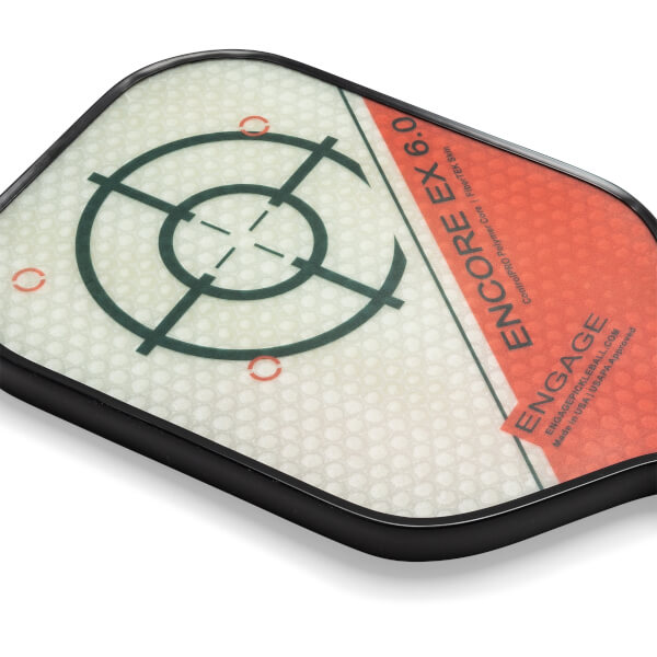 Top-down view of a white and orange pickleball paddle with a target design and ENGAGE ENCORE EX 6.0 text.