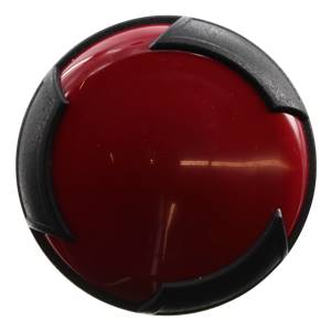 Top-down view of a red baseball bat end cap with black accents.