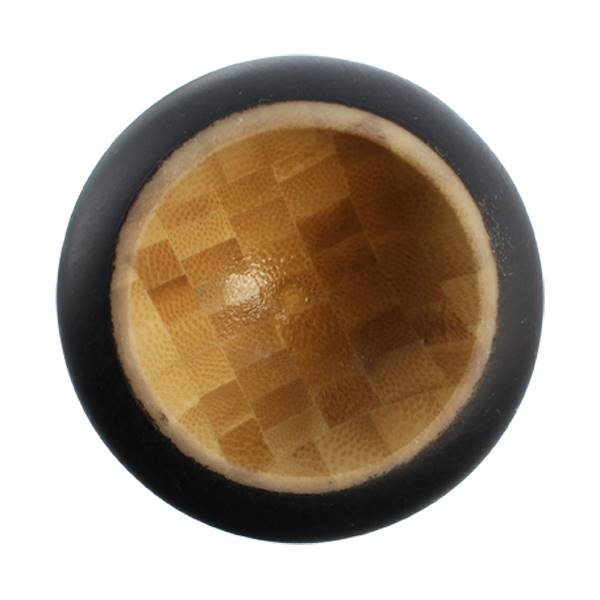 Top-down view of a black baseball bat end with a woven bamboo interior.
