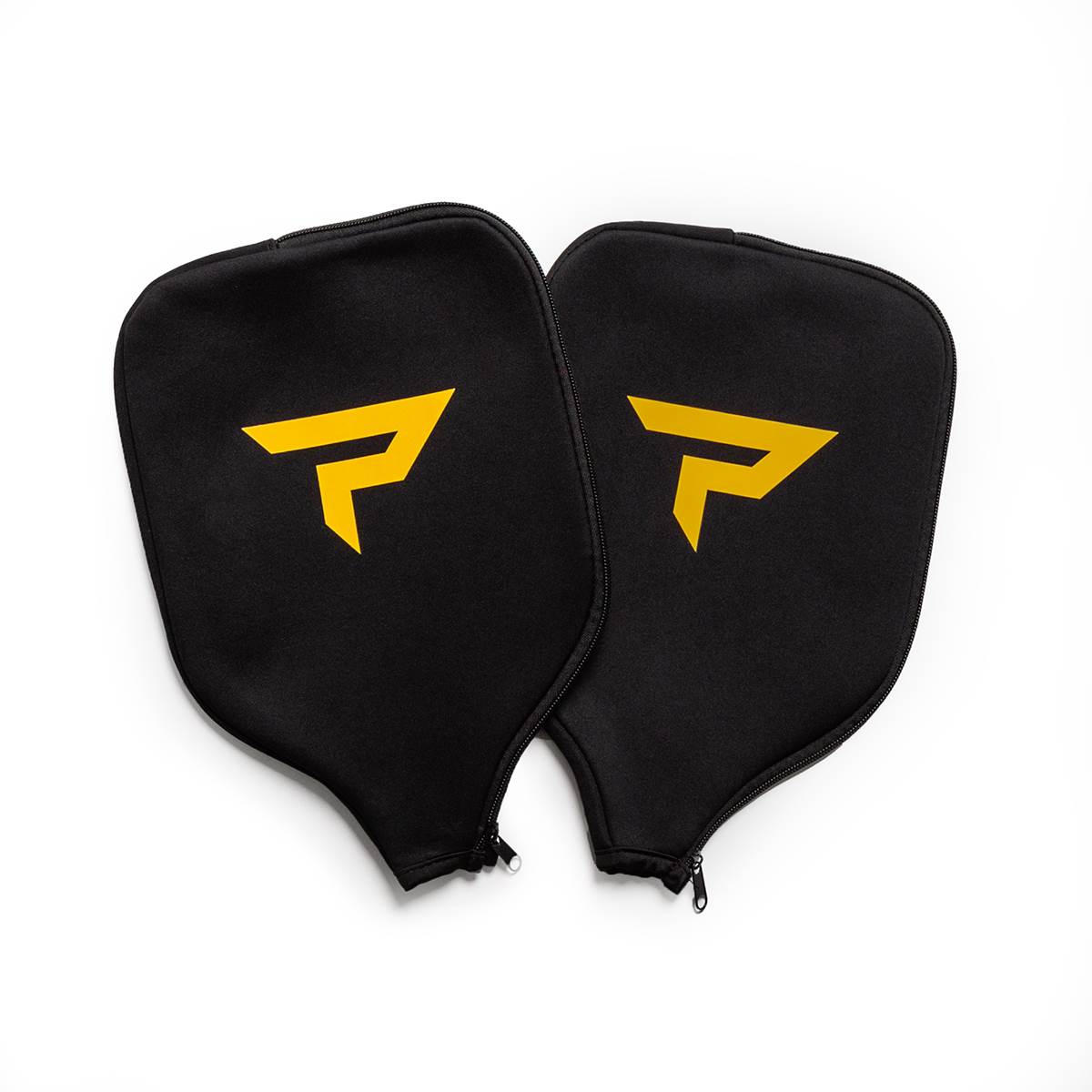 Top-down view of two black pickleball paddle covers with yellow P logos and zippers.