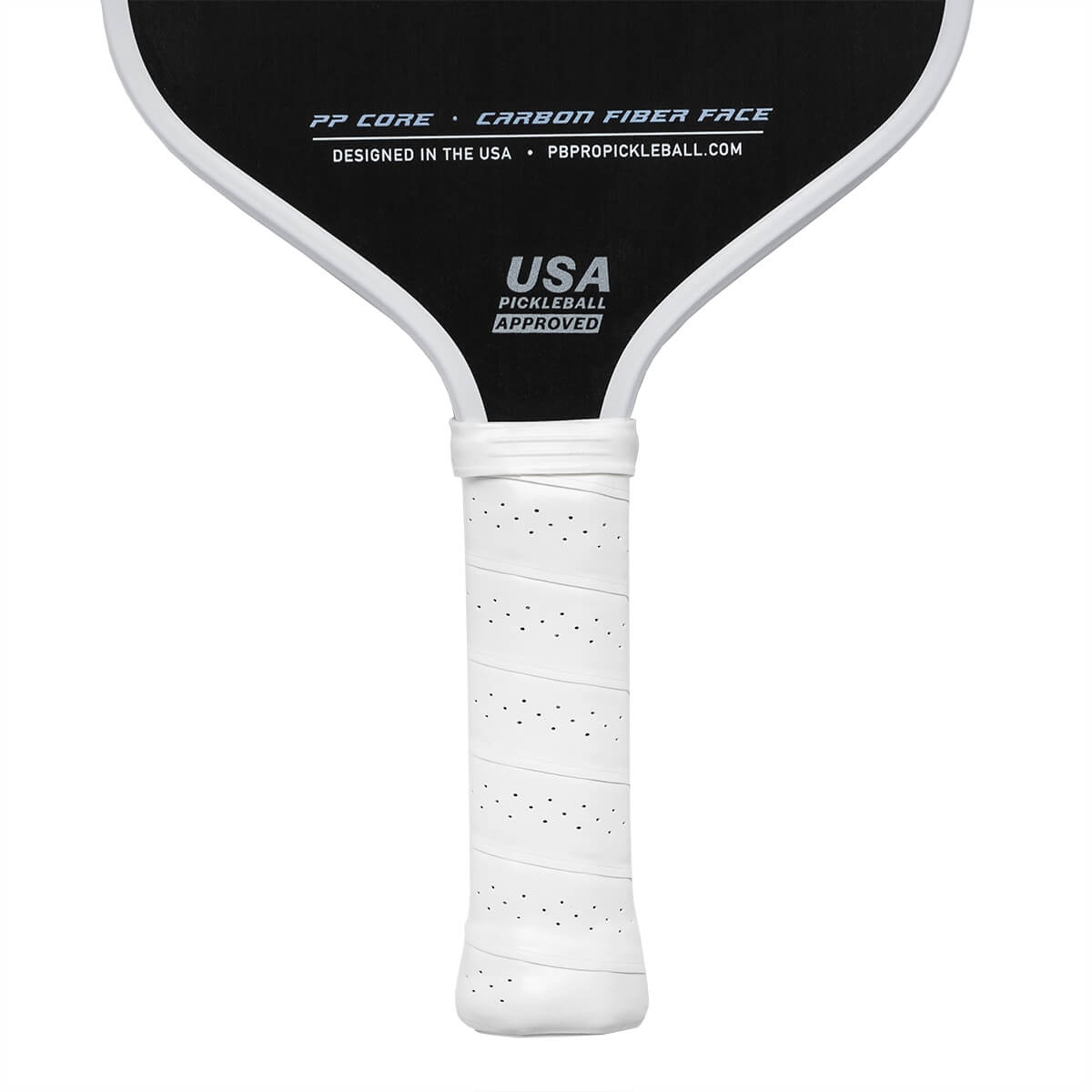 Top-down view of a black pickleball paddle with white grip, USA PICKLEBALL APPROVED text, and PBPROPICKLEBALL.COM website.