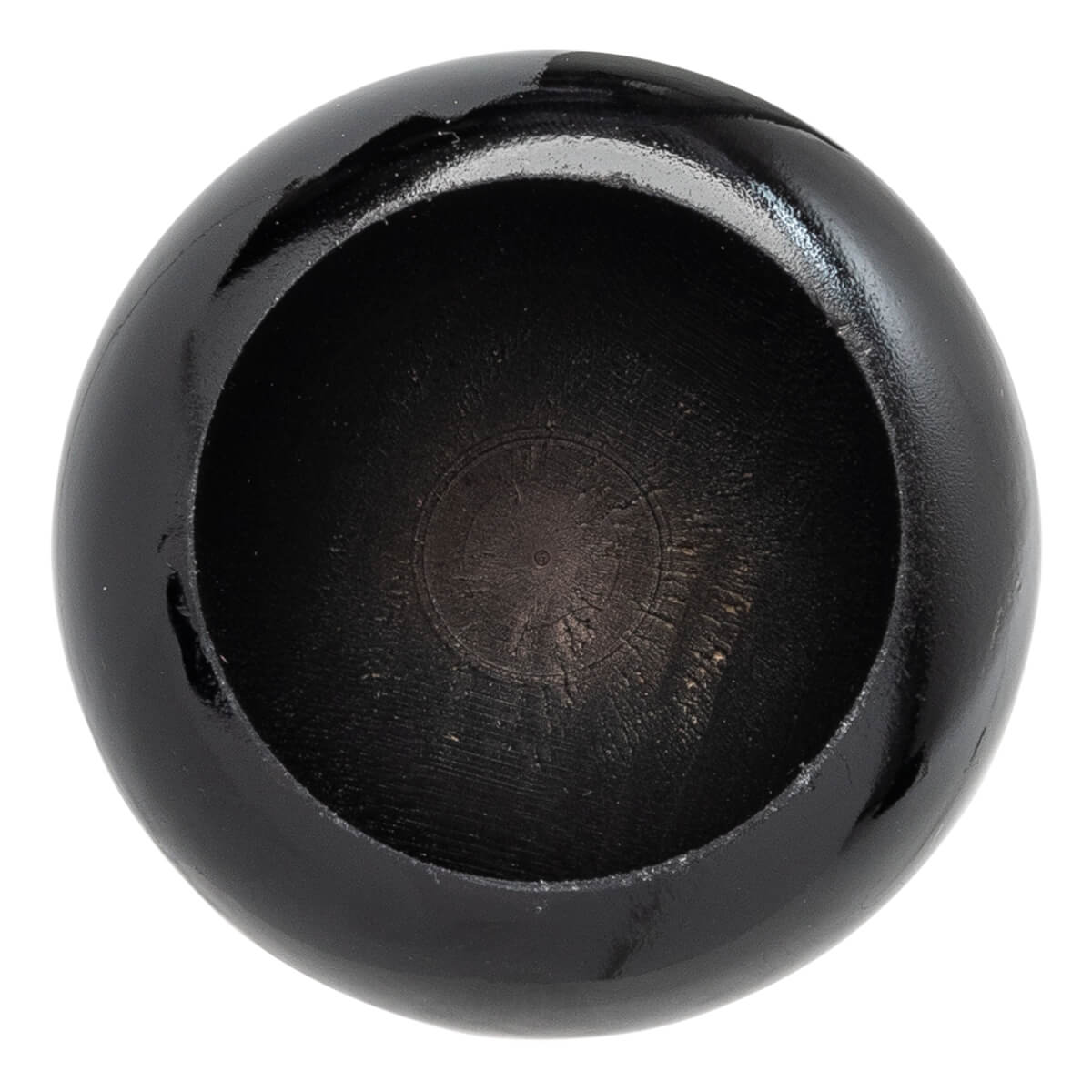 Top-down view of a black baseball bat end with a hollowed center and visible wood grain.