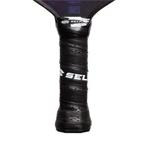 Close-up of a black pickleball paddle grip with SEL logo and USAPA APPROVED text.