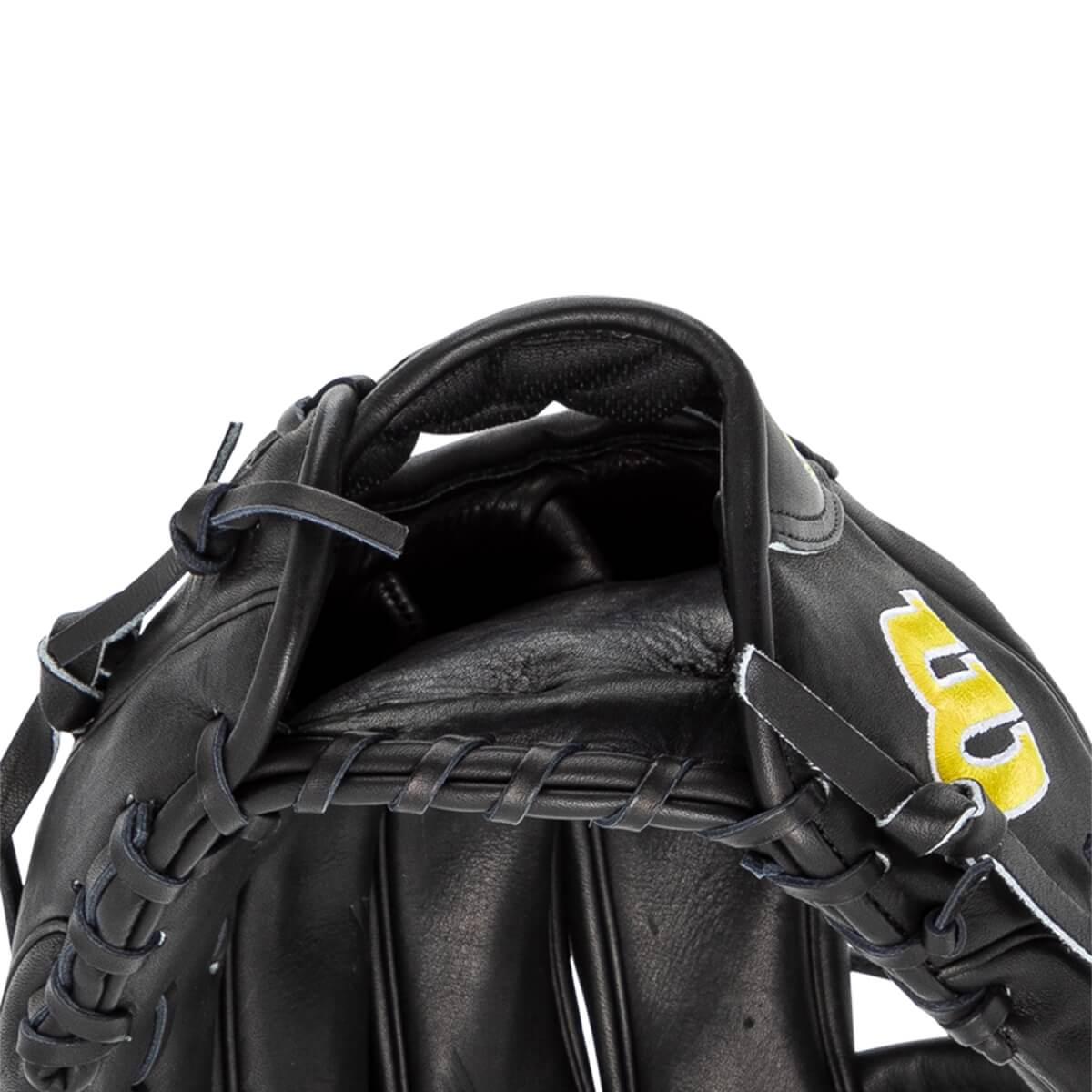 Close-up of the hand opening on the black leather glove, featuring thick interior padding and a yellow and white Wilson W logo embroidered on the wrist strap.