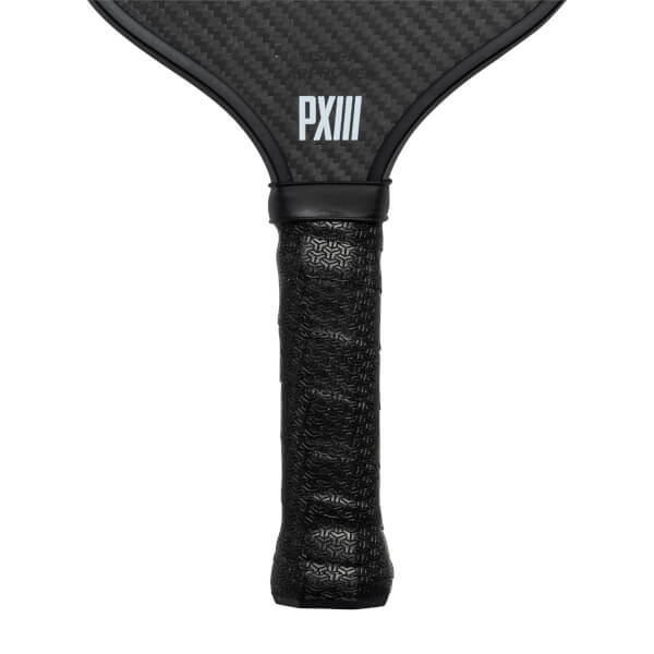 Top-down view of a black pickleball paddle with a carbon fiber surface and PXIII text.