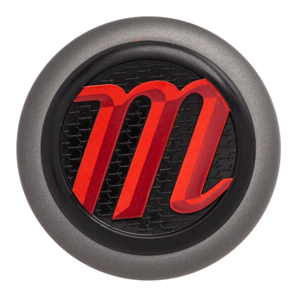 Top-down view of a gray baseball bat end cap with a red m logo on a black textured background.