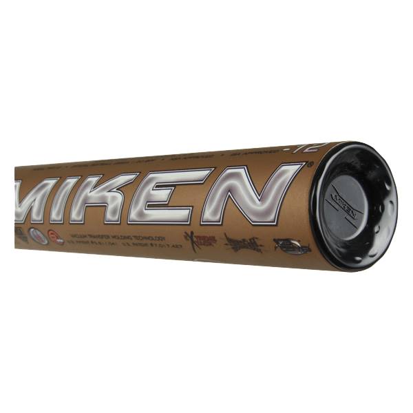 End view of a gold Miken bat with black end cap and visible branding.