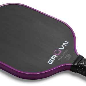Close-up of a purple pickleball paddle with GRUVN RAW-16S branding and a textured black surface.