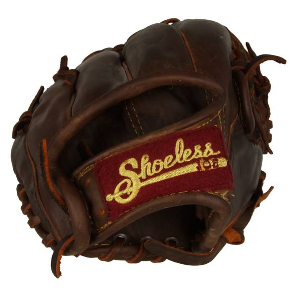 Close-up of a brown baseball glove with a red and gold Shoeless Joe patch.