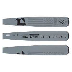 Side view of a gray baseball bat with DEMARINI The GOODS text and an American flag graphic.