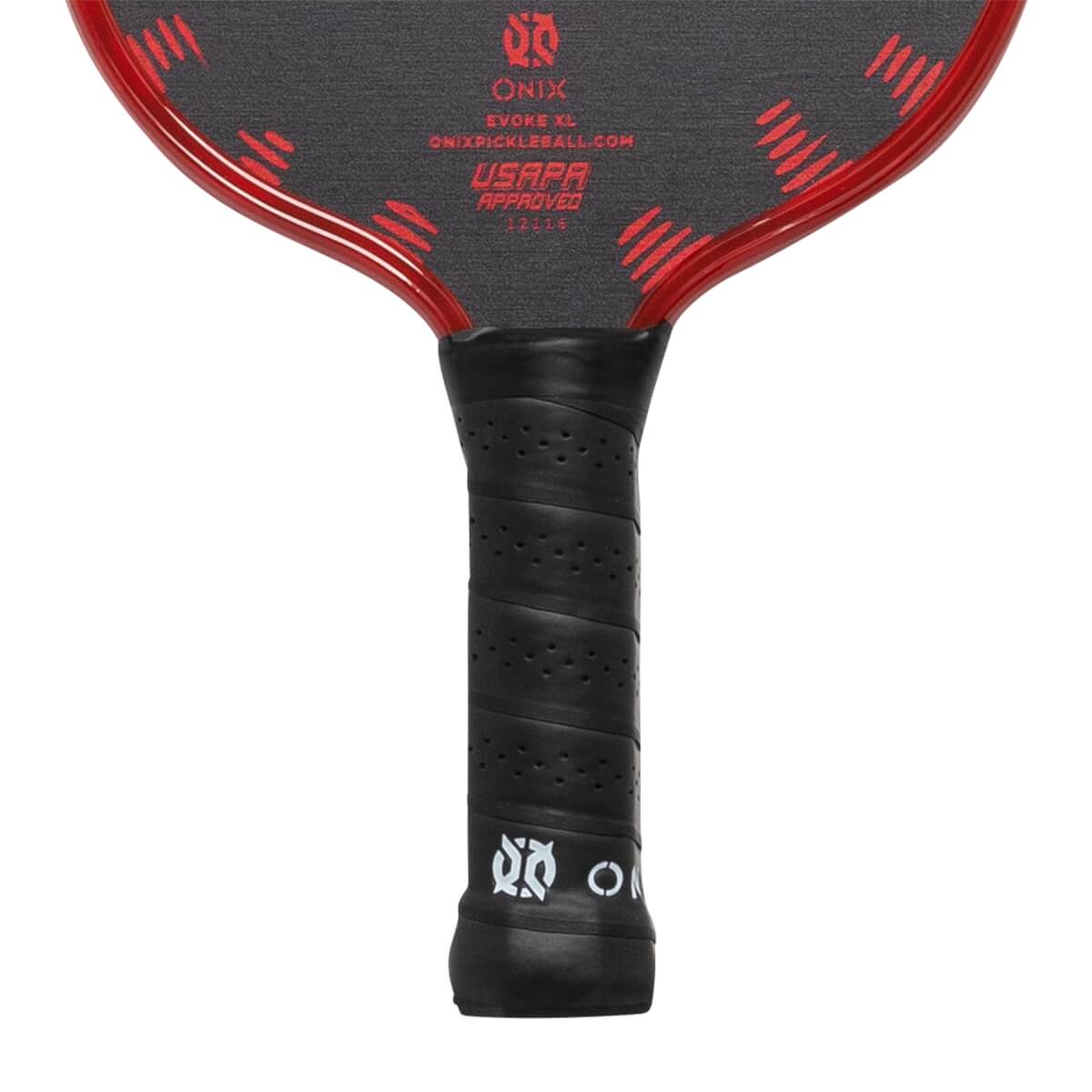 Close-up of a black pickleball paddle grip with USAPA approved text and red accents on the paddle face.