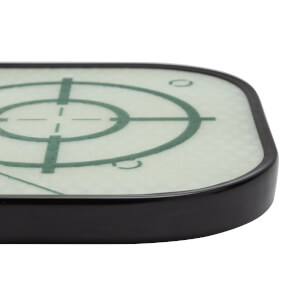 Close-up of a black pickleball paddle with a green target design and textured surface.