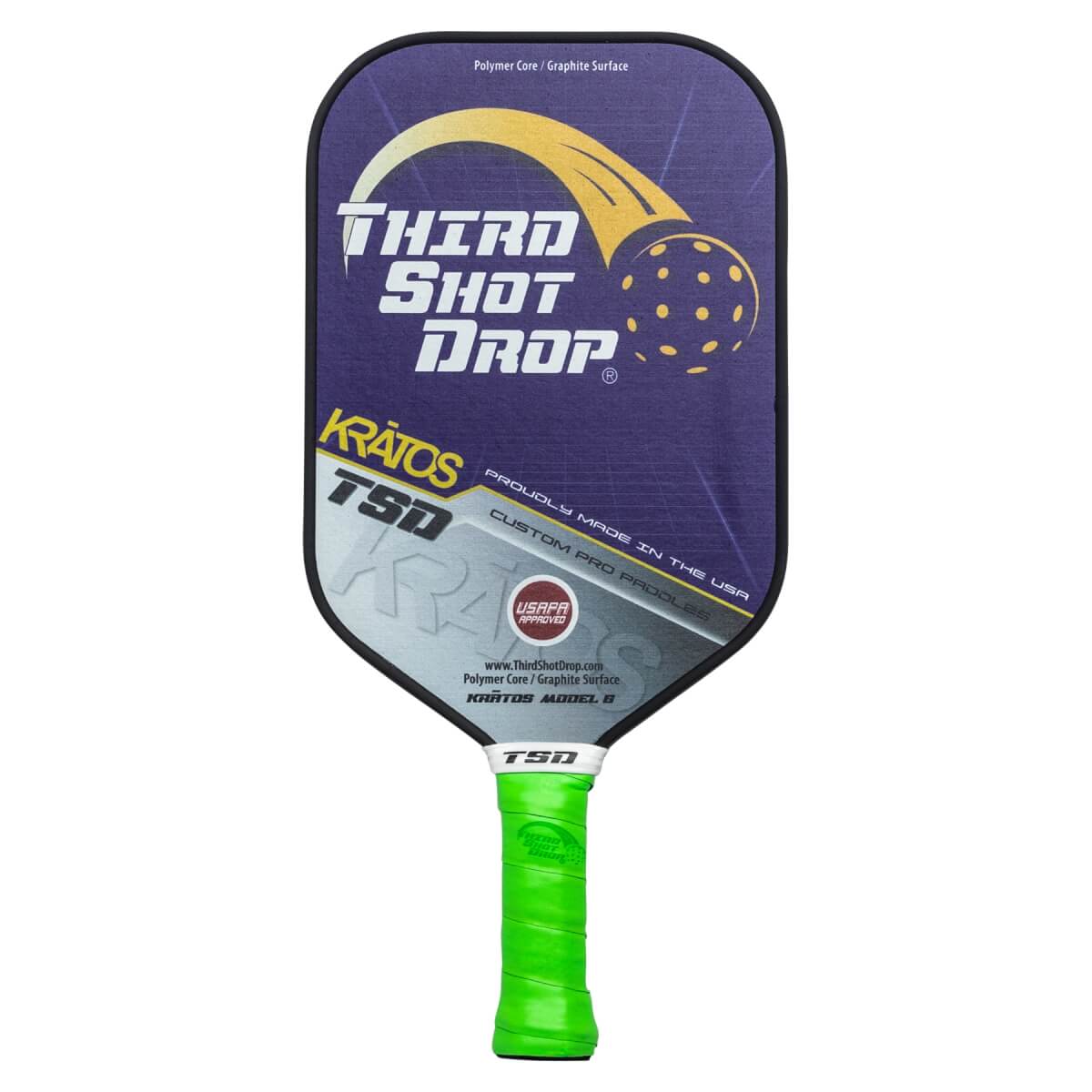 Front view of a purple pickleball paddle with THIRD SHOT DROP text, a pickleball graphic, and a green grip.