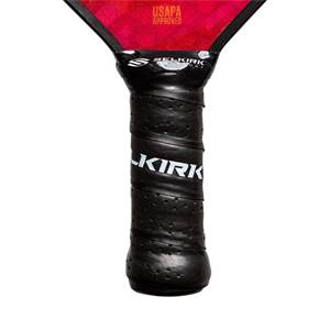 Close-up of a black pickleball paddle grip with KIRK branding and perforated texture.