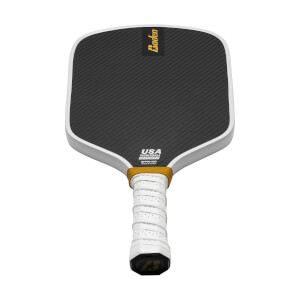 Front view of a white pickleball paddle with a black carbon fiber face, Baden logo, and white grip.