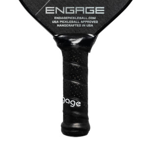 Close-up of a black pickleball paddle grip with perforations and Engage text.