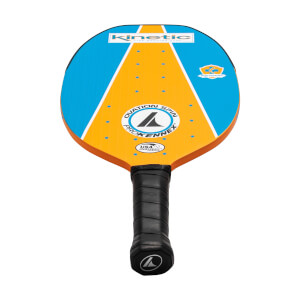 Top-down view of a blue and orange pickleball paddle with Kinetic and ProKennex Ovation Spin text.