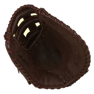 Top-down view of a brown softball first base mitt with white stitching and a deep pocket.