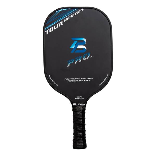 Front view of a black pickleball paddle with blue TOUR SIGNATURE text, a blue B PRO logo, and USAPA APPROVED text.