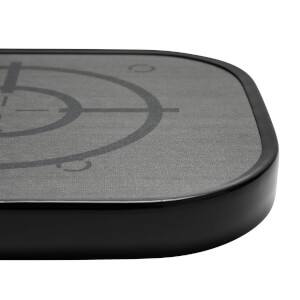 Corner view of a gray pickleball paddle with a black edge and target graphic.