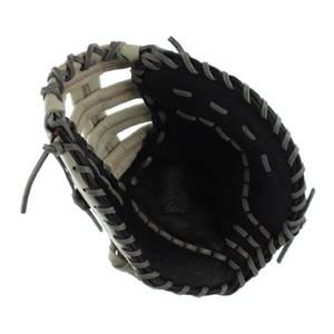 Top-down view of a black and tan youth first base mitt with grey lacing and red stitching.