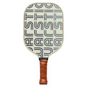 Front view of a cream pickleball paddle with repeating gray WARSTIC text and a brown grip.