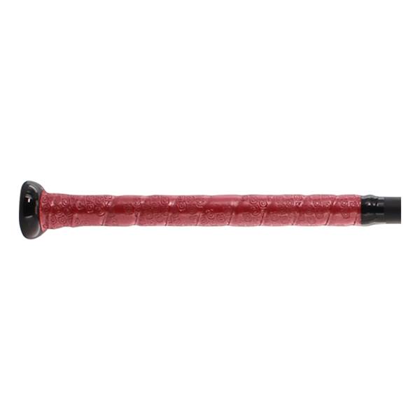 Close-up of a red bat grip with a textured pattern and black end cap.