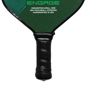 Close-up of a black pickleball paddle grip with perforated texture and spiral wrapping.