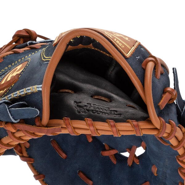 Close-up of a blue baseball glove with brown lacing and a Deer Tanned Cowhide stamp.
