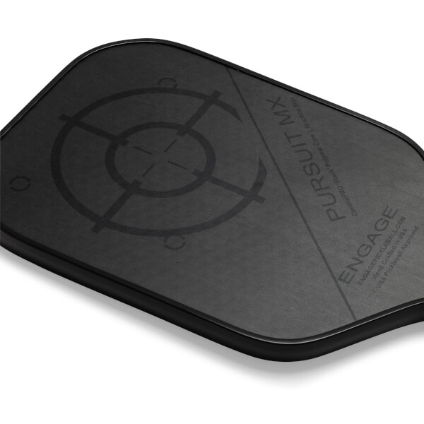 Corner view of a black pickleball paddle with a target design and PURSUIT MX text.