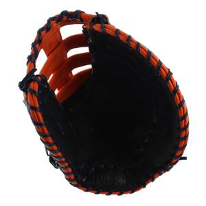 Top-down view of a black first base mitt with orange interior and navy lacing.