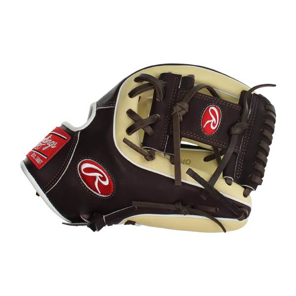 Side view of a brown and tan baseball glove with Rawlings branding and Est. 1887 text.