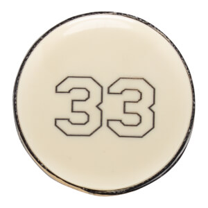 Top-down close-up of an off-white baseball bat end cap with the number 33 printed in black.