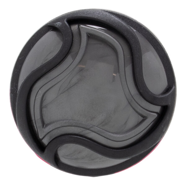 Top-down view of a dark gray bat end cap with a raised black curved design and a slightly translucent center.