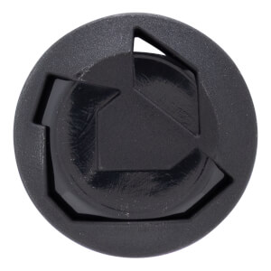 Close-up of a black bat end cap with a circular shape, raised geometric design, and textured outer ring.