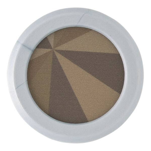 Top-down view of a light gray circular makeup compact with brown powder in a sunburst pattern.