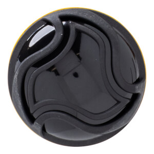 Top-down view of a black bat end cap with a yellow rim and a wavy, layered design.